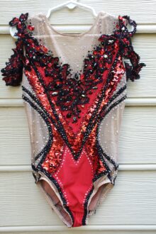 Deep red rhythmic gymnastics leotard
