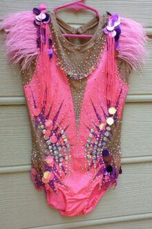 Pink with feathery shoulders rhythmic gymnastics leotard