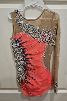 Xcel bronze, silver, gold, platinum and FIG level orange leotard